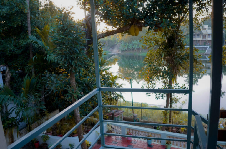 Gallery balcony with railing and river view