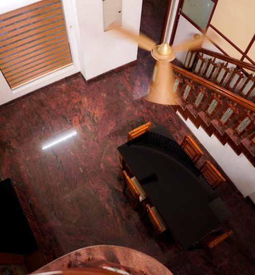 Gallery top view dining area with staircase